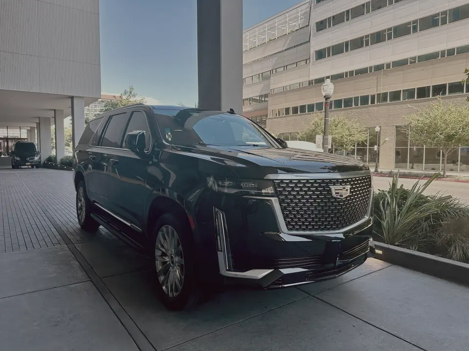Front view of a black Cadillac Escalade